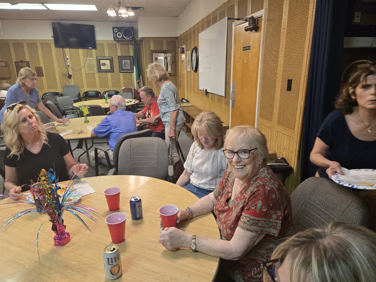 Guests enjoying a party in the hall