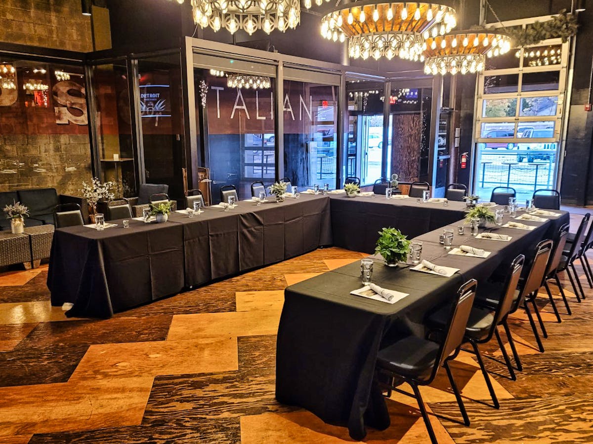 A building with glass windows bar on a table from the official site
